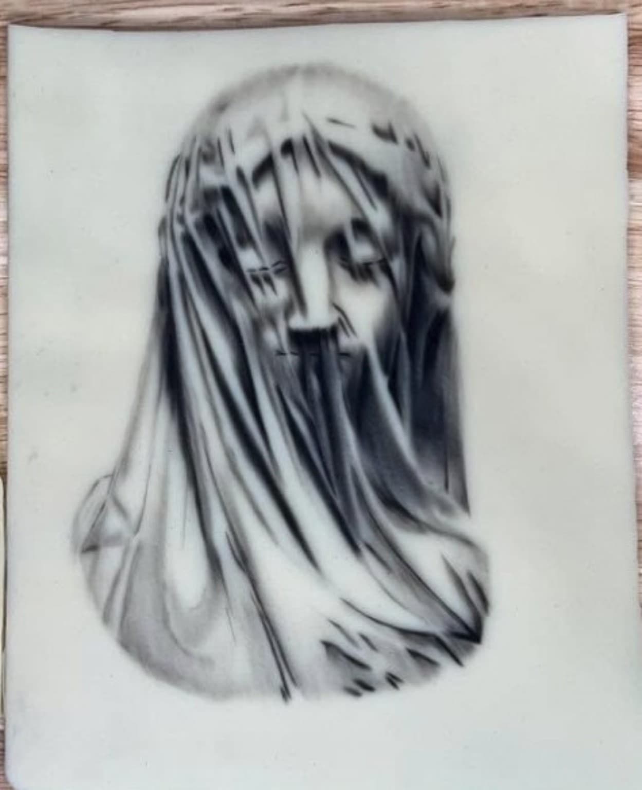 maiden hidden behind a veil